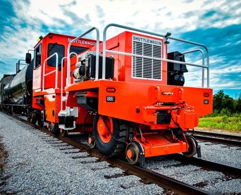 Close-up image of a Shuttlewagon diesel railcar mover on the railroad